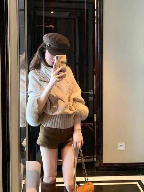 オフショルケーブルニット