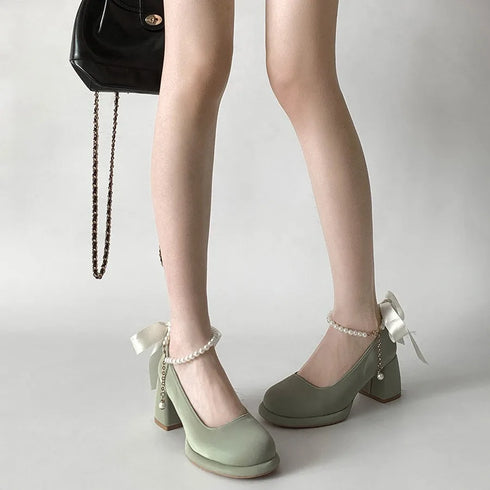 ころんパールパンプス