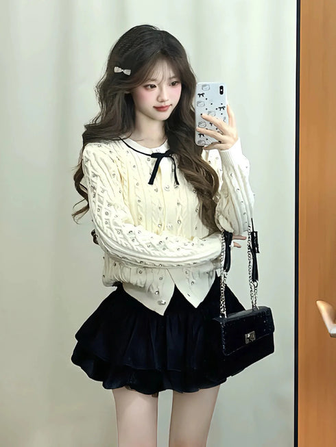 ビジューケーブルニットカーディガン