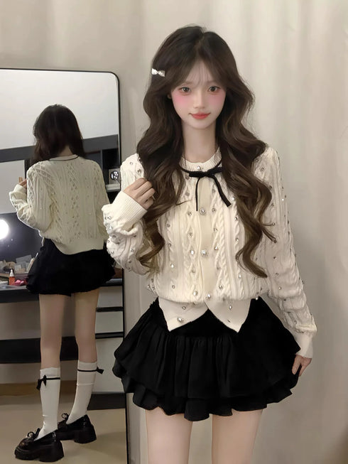 ビジューケーブルニットカーディガン