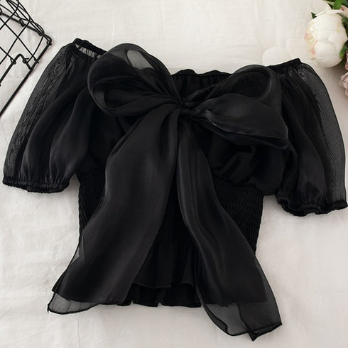 バックリボンシアートップス